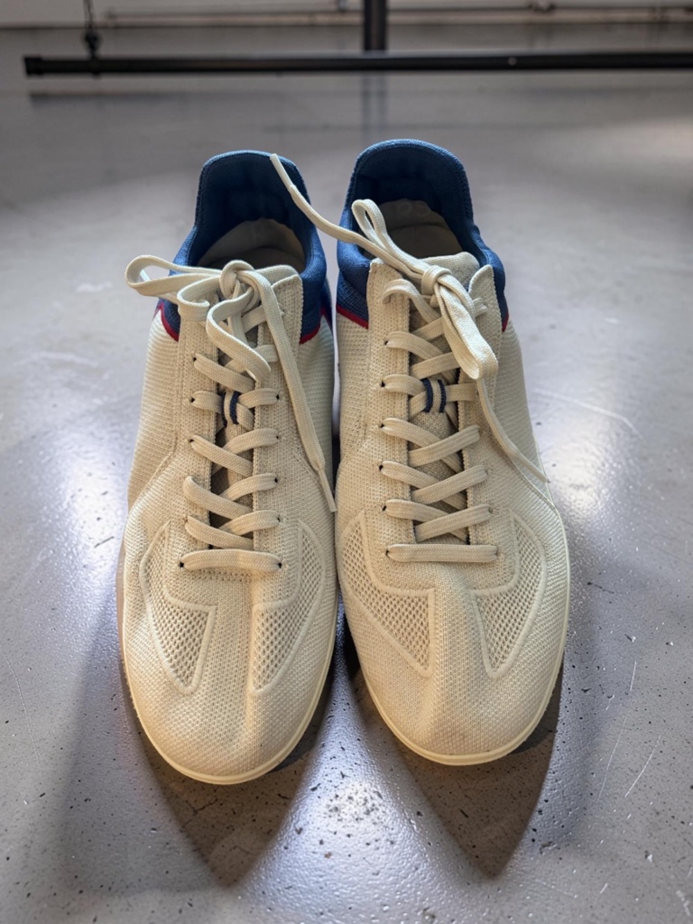 Rothy’s The RS01 Men’s Cream Sneakers w/ Blue & Red Accents